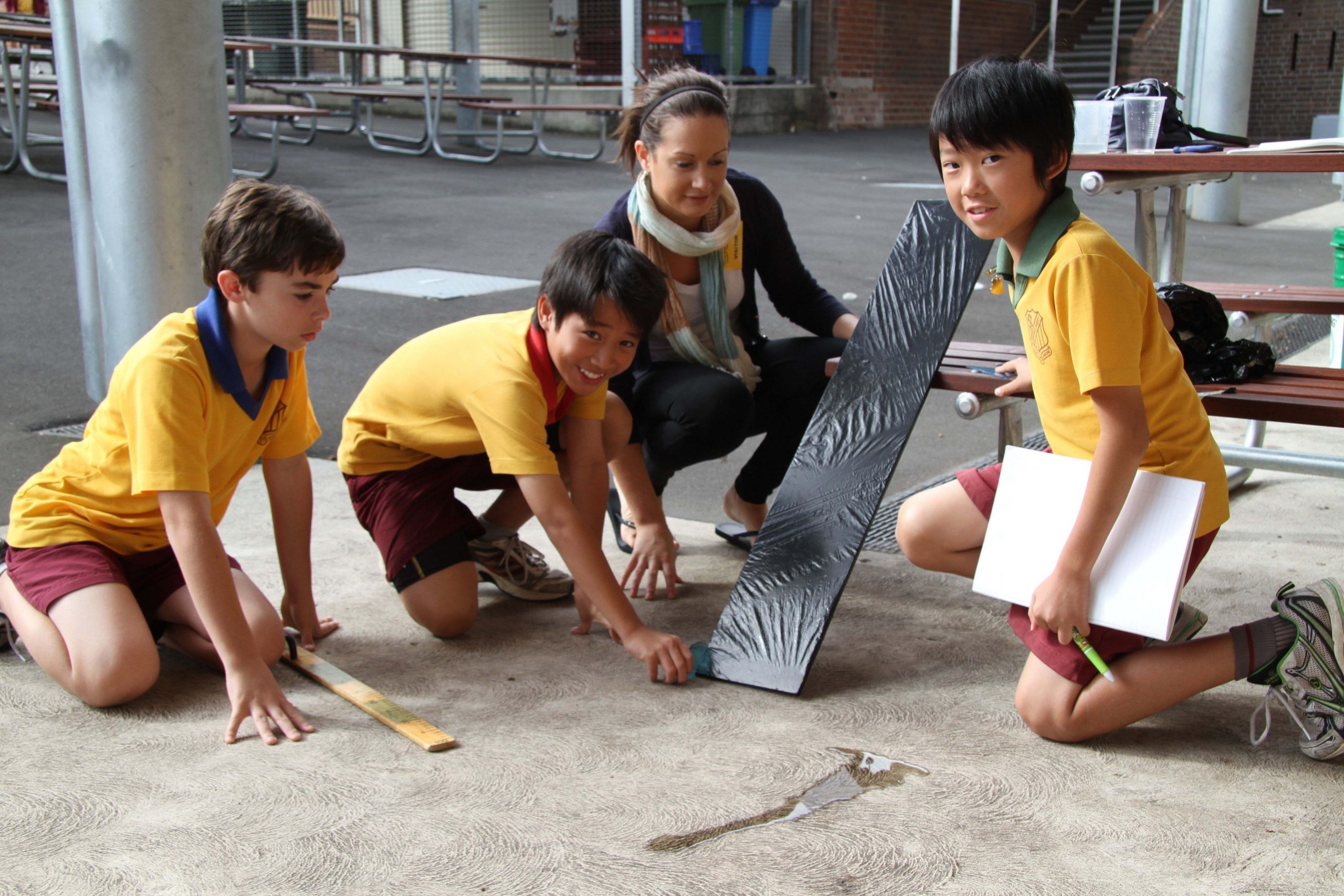 Students conducting an avalanche experiment